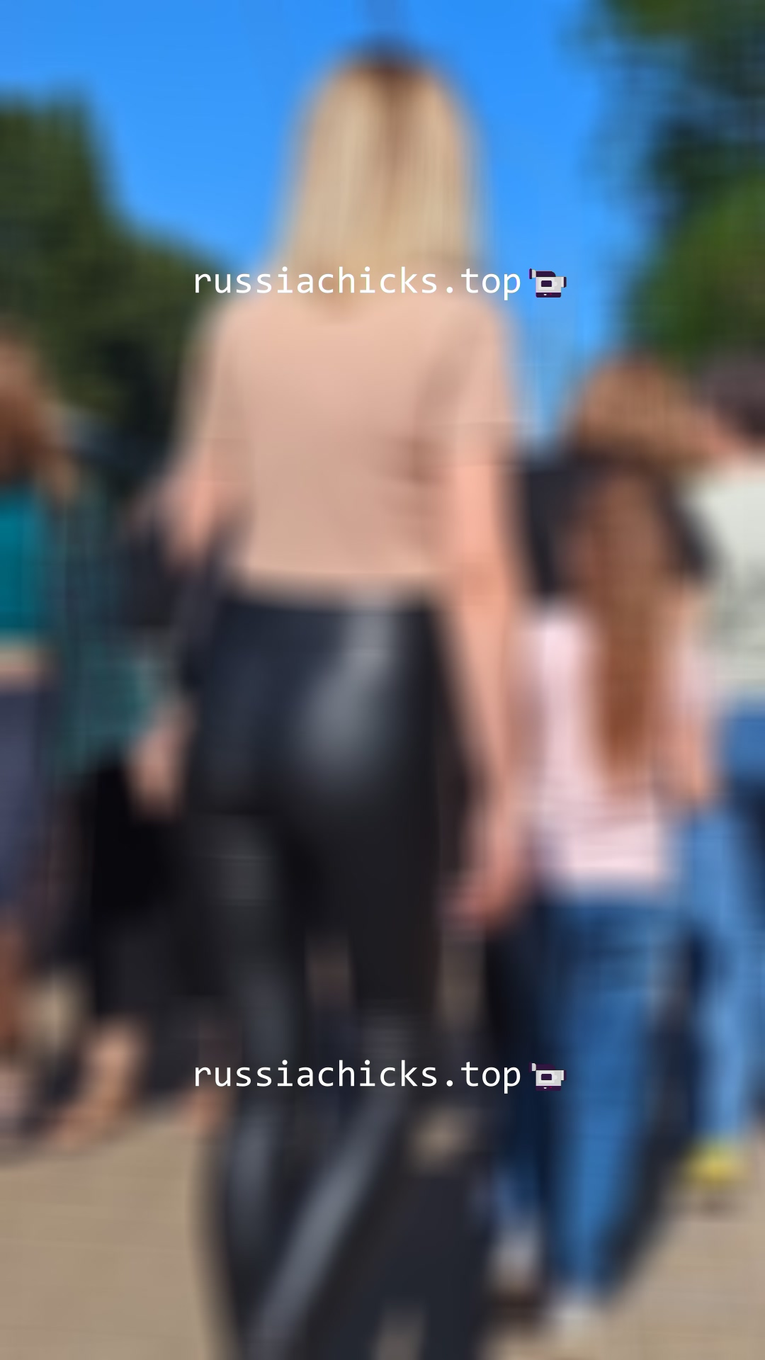 sexy woman ass in leather leggings