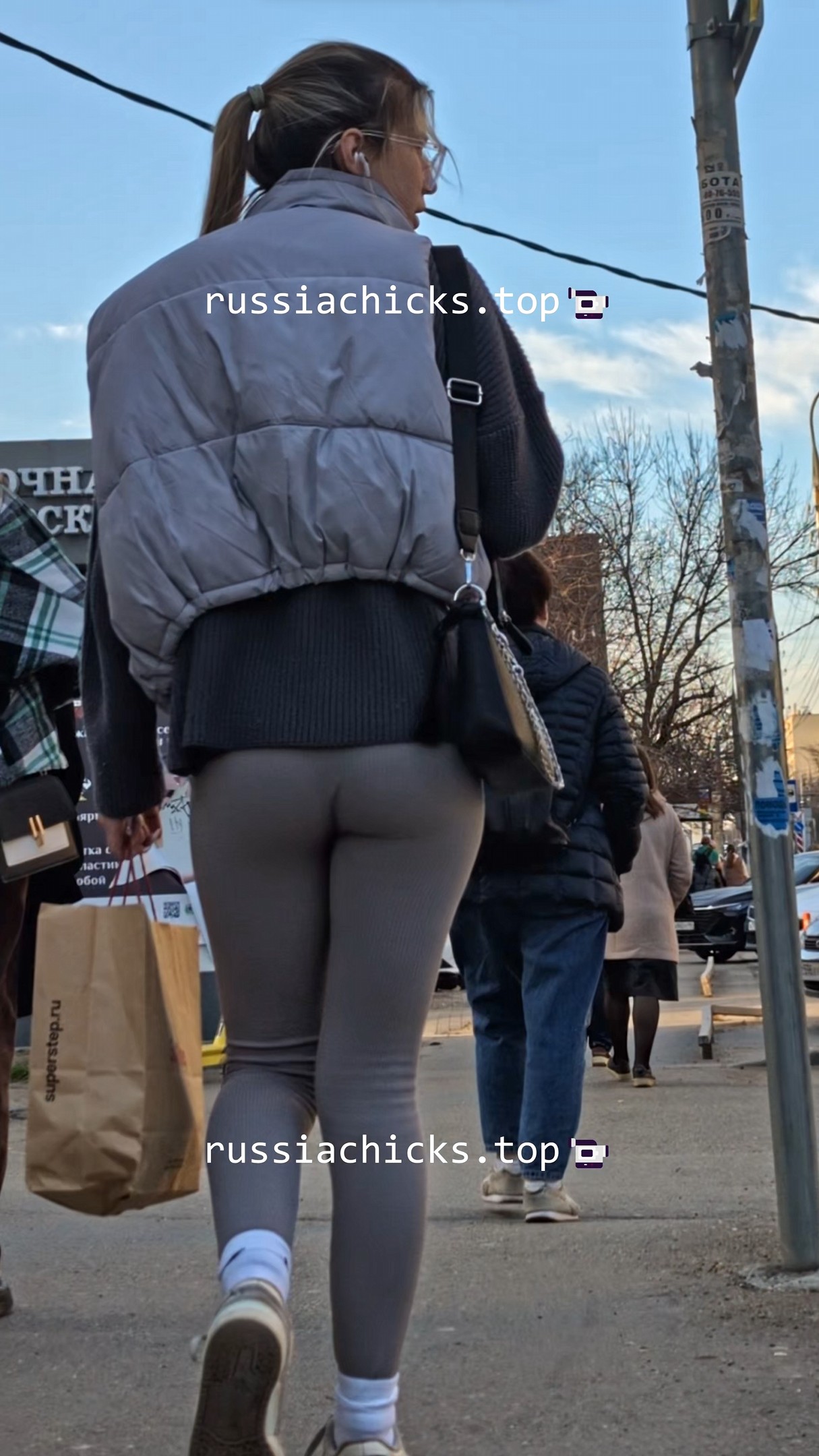 sexy girl in leggings and her ass