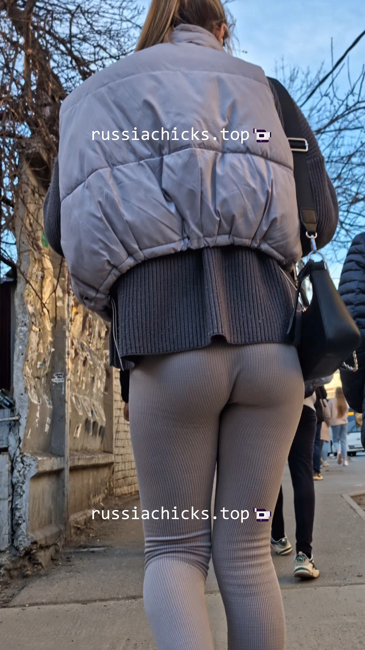 sexy girl in leggings and her ass