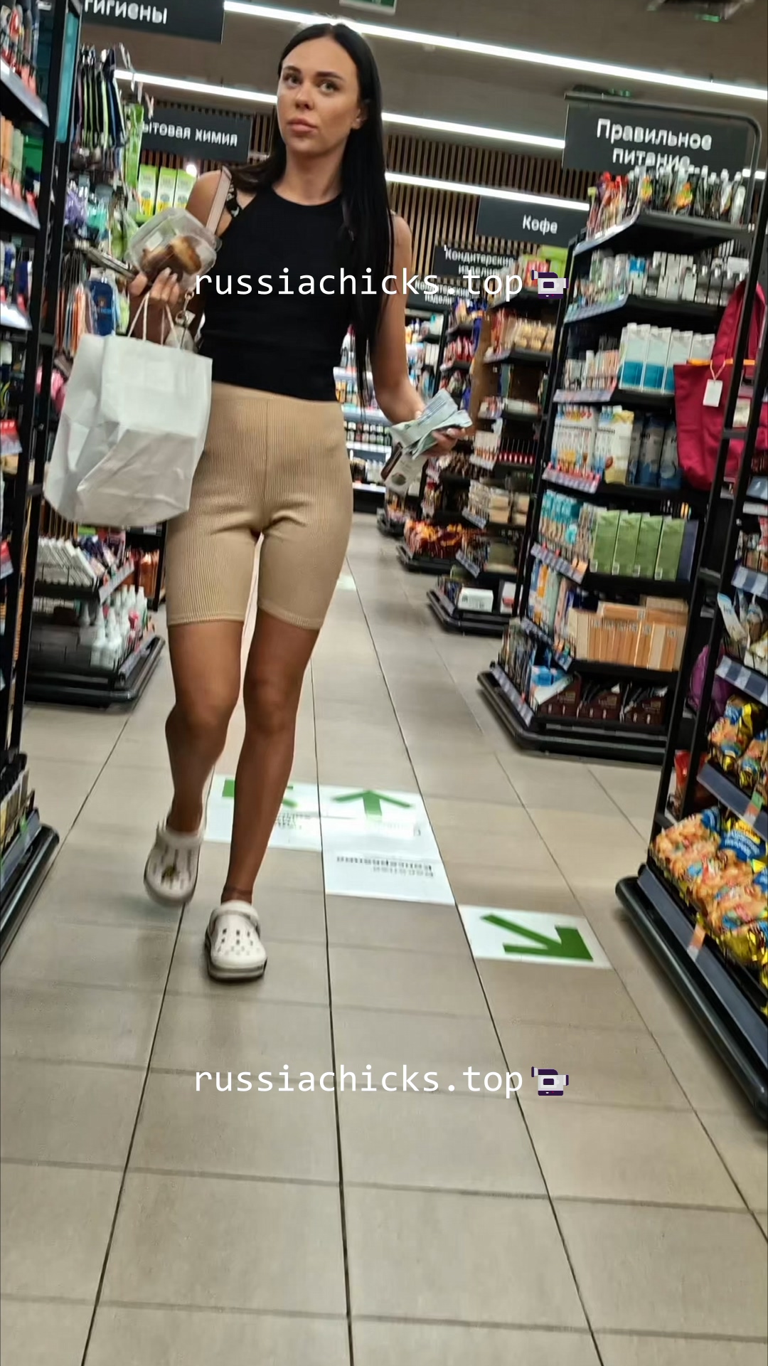 sexy girl in store in tight shorts