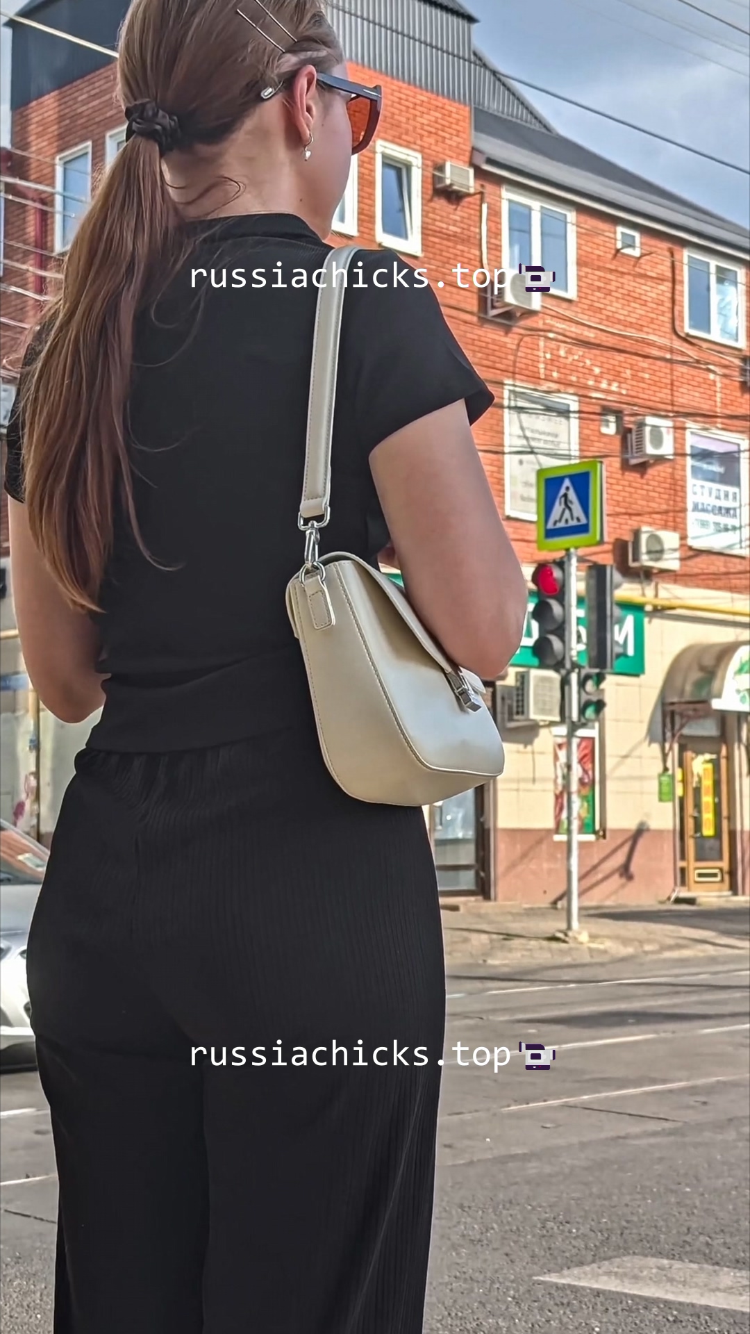 teen girl in nice pants on street