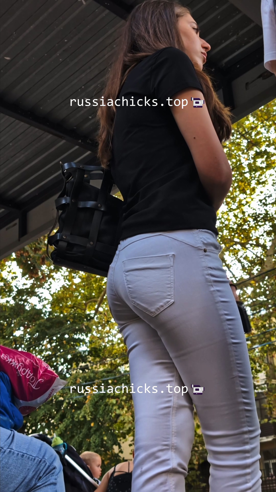 beauty girl in tight white jeans